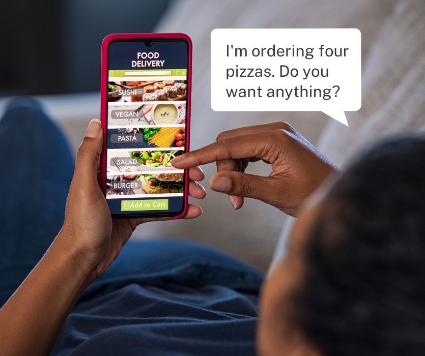 15 week pregnant woman ordering food on a phone saying, "I'm ordering four pizzas. Do you want anything?"