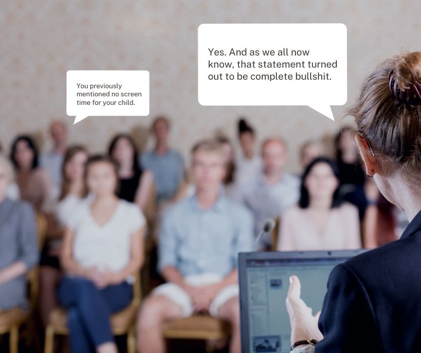 woman giving a speech to a crowd