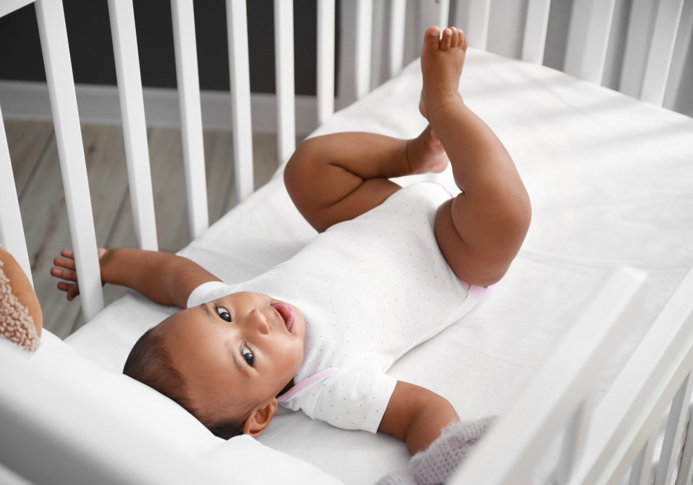 Canadian baby in crib