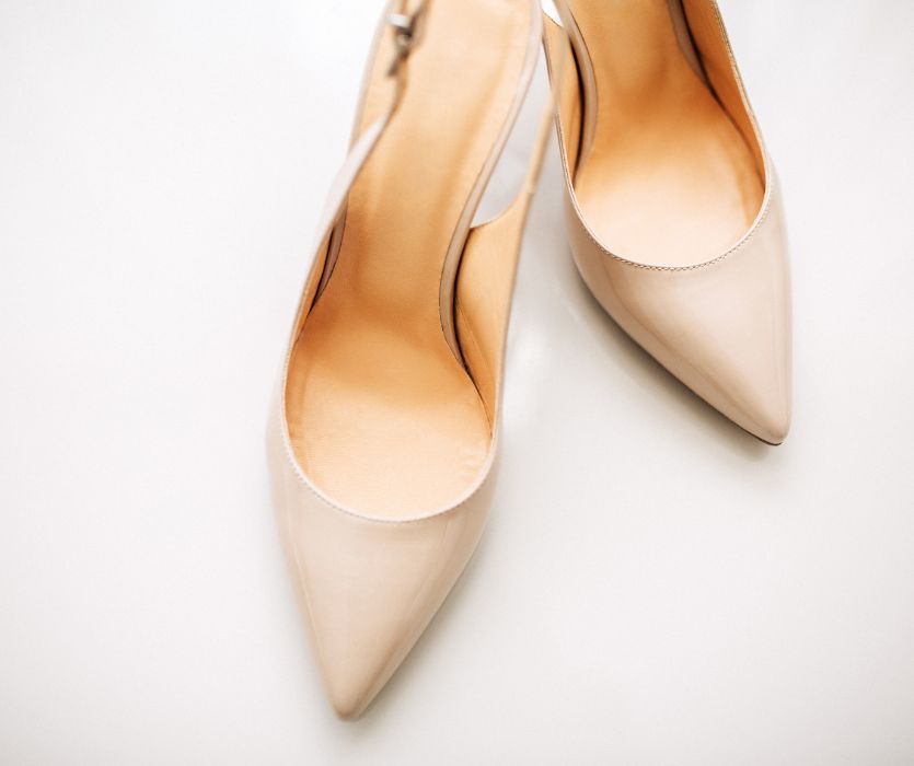 pair of cream colored high heels