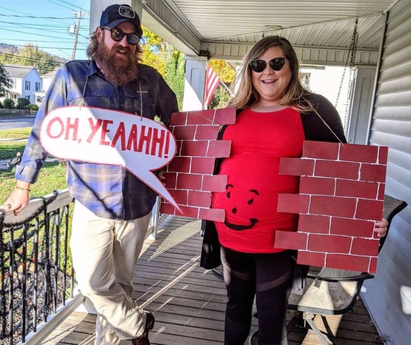 couple dressed for halloween as a pregnant koolaid man and oh yeah cutout