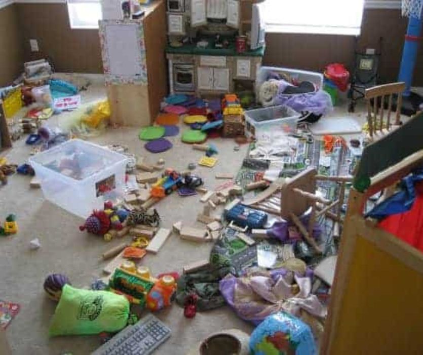 mom shows a picture of a messy room her kids have destroyed