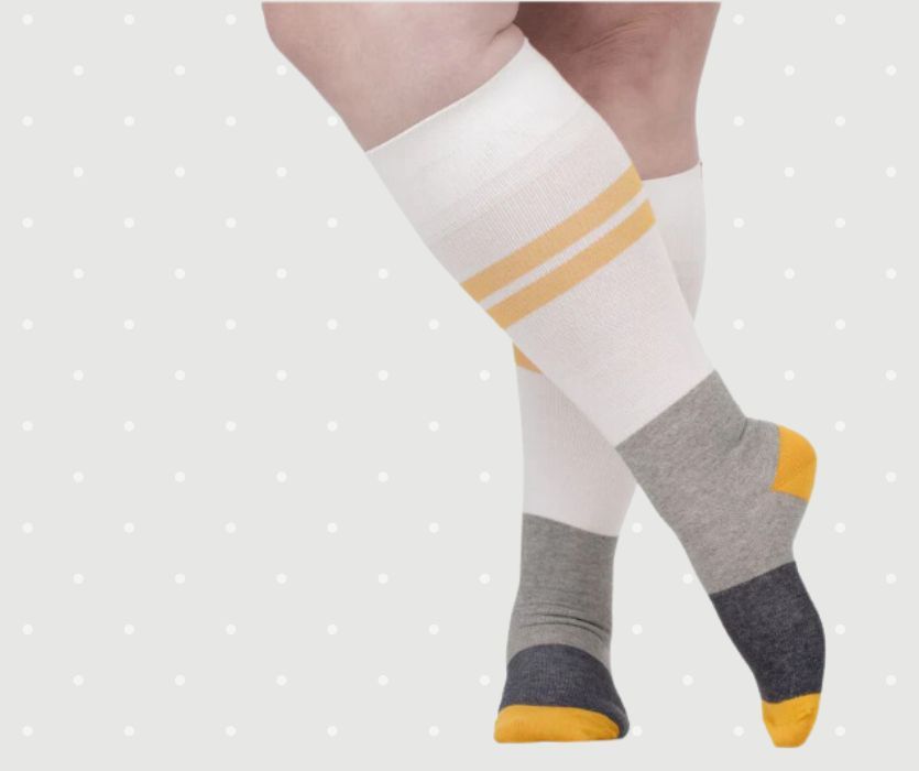 pregnant woman wearing compression socks