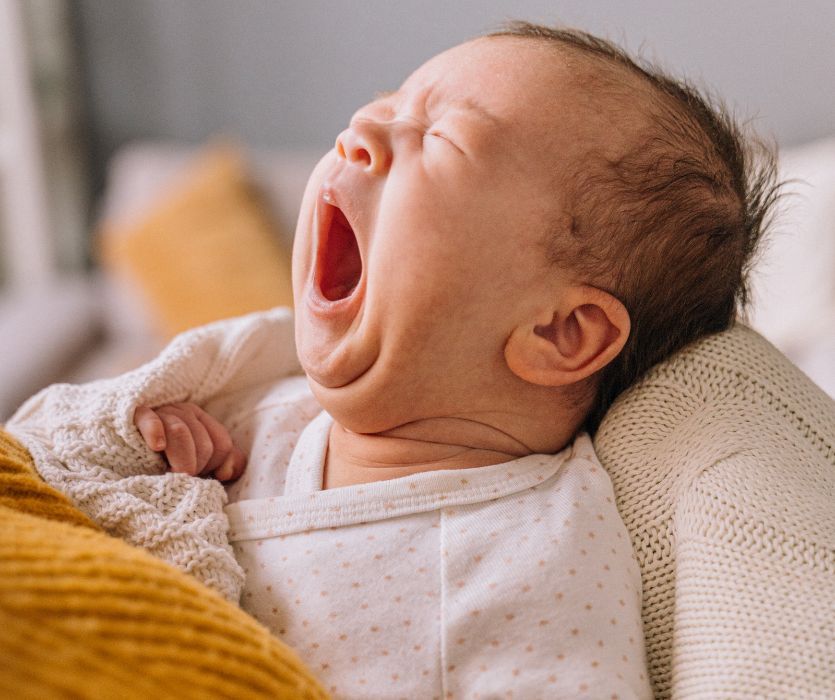 yawning newborn baby