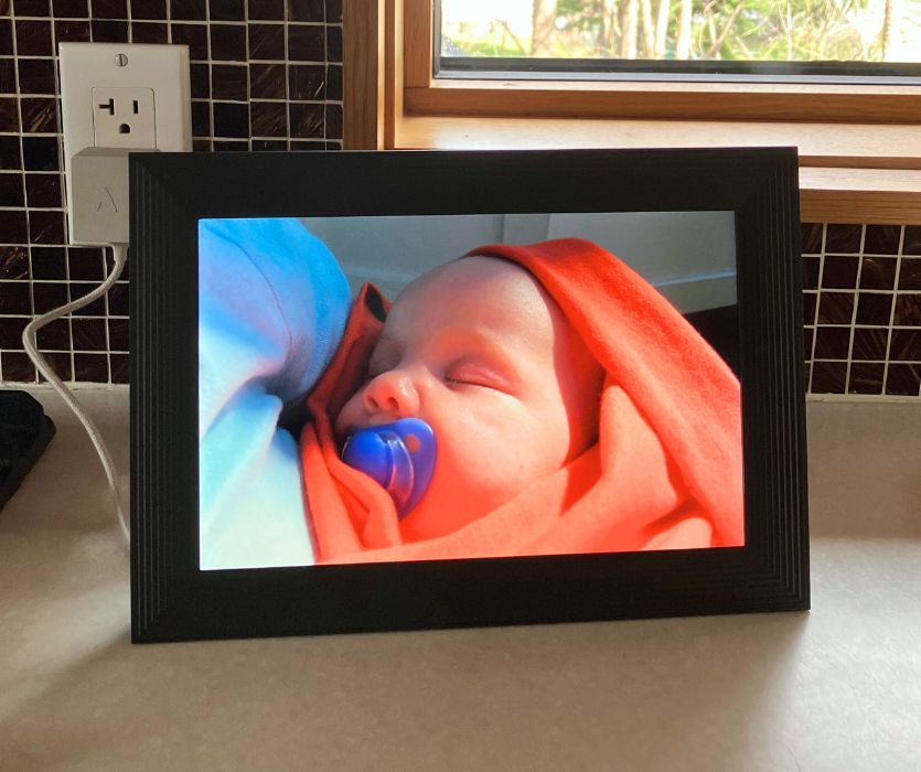 aura digital photo frame set up at grandparents' house