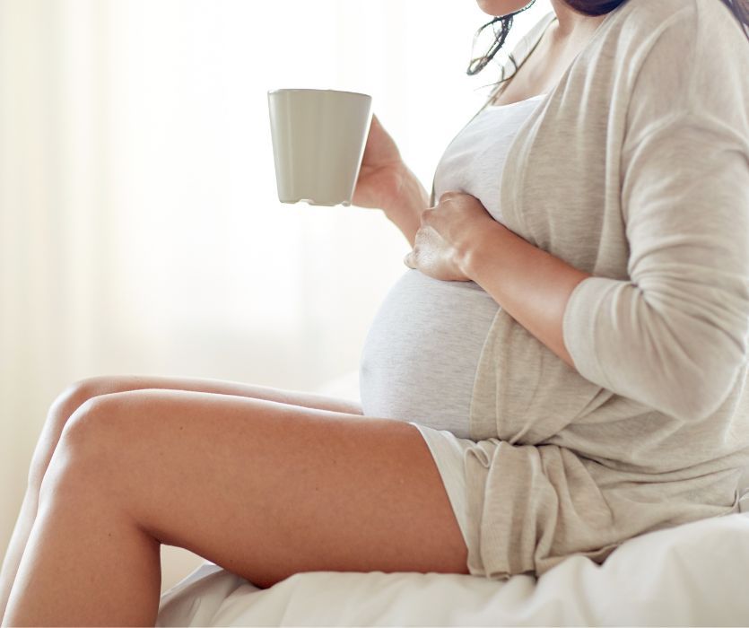 pregnant woman with Gestational Diabetes with mug of tea