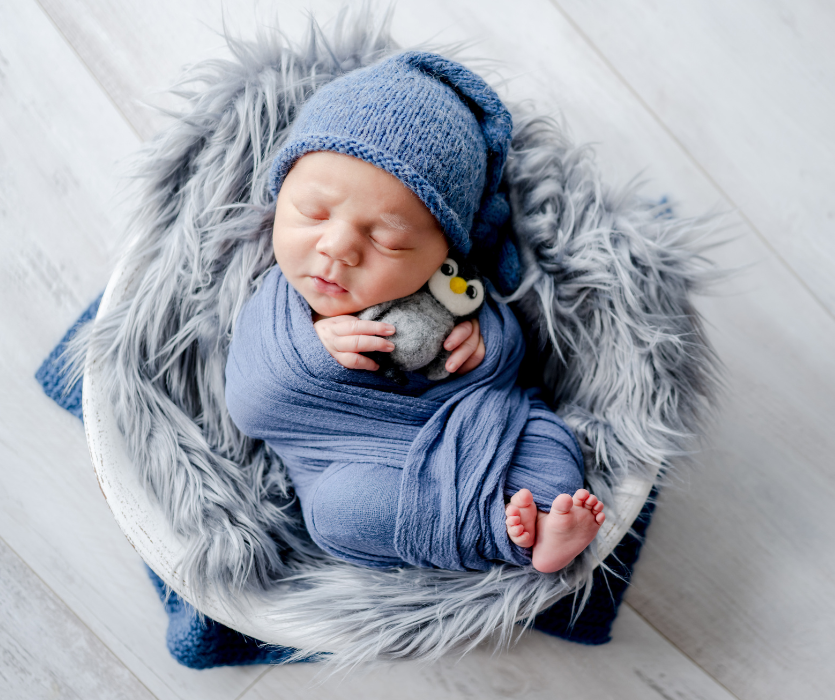 january baby wrapped in blue