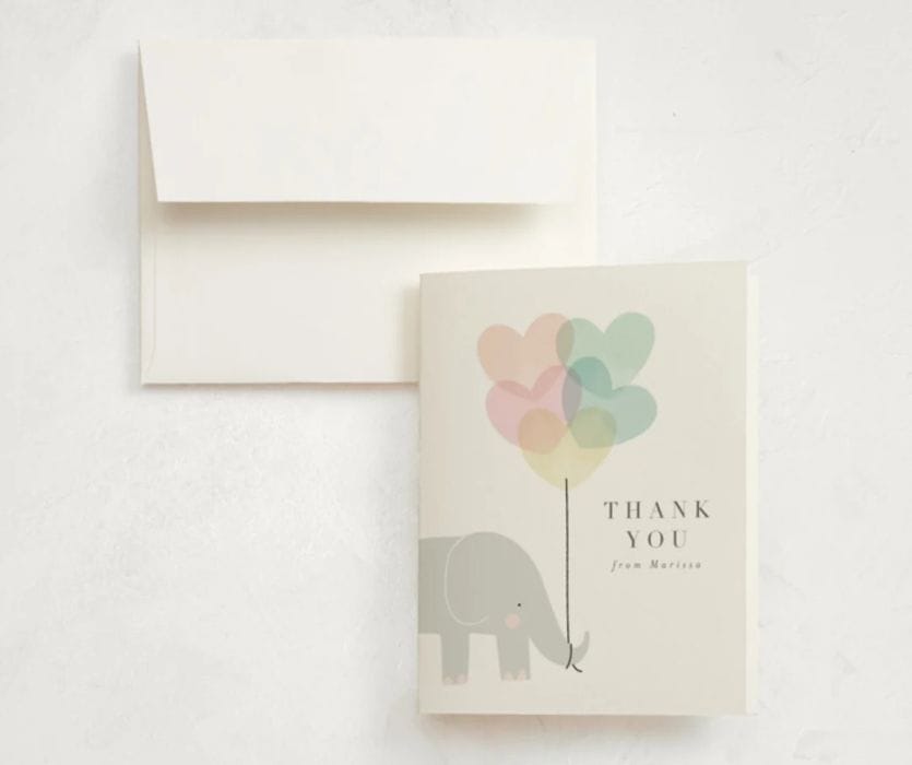 baby shower thank you card with personalization and an elephant holding heart balloons