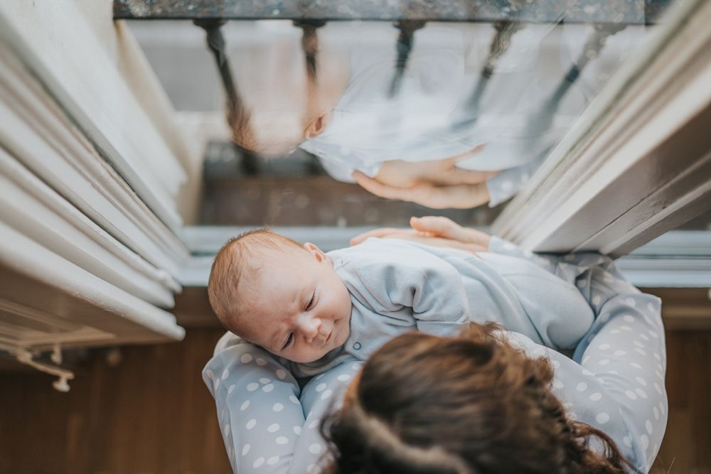 Mom holding her only child has decided she is one and done