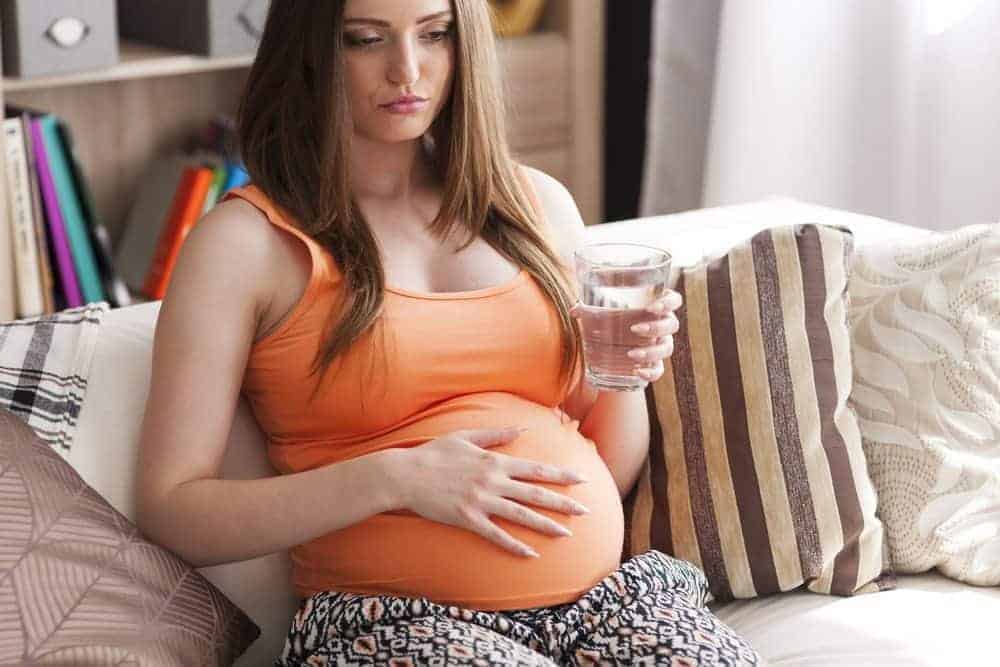 pregnant woman thinking, 21 Questions I Asked My Pregnant Self in a Single Day