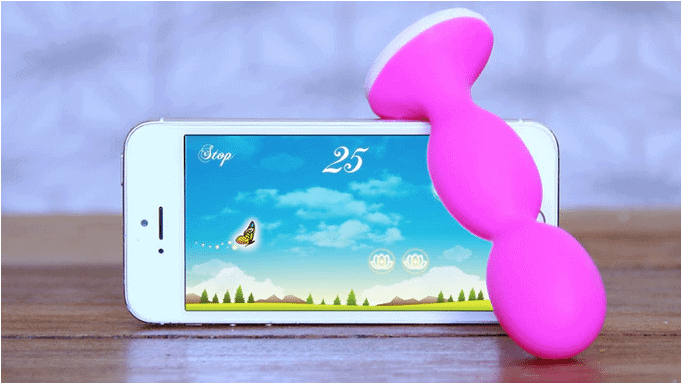 Pink Perifit pelvic floor strengthening wand next to iOS device
