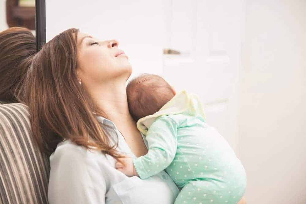 new mom sleeping with baby on her chest - I don't want my body back