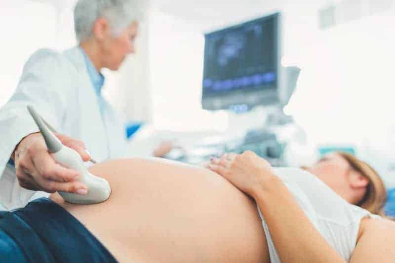 pregnant woman on diagnosis day getting news of fetal abnormality
