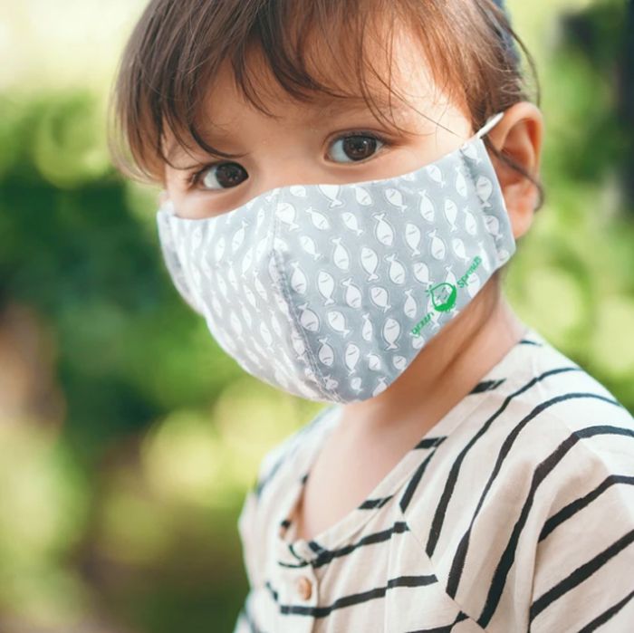 toddler wearing a fabric reusable mask