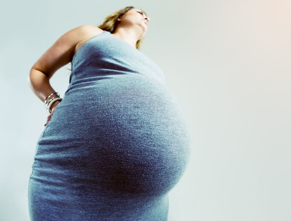 woman frustrated about her pregnant body comments from people