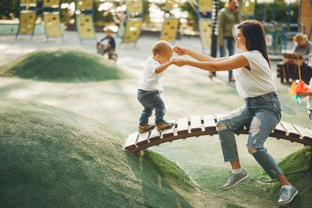 toddler in playground with mom who feels better after taking antidepressants